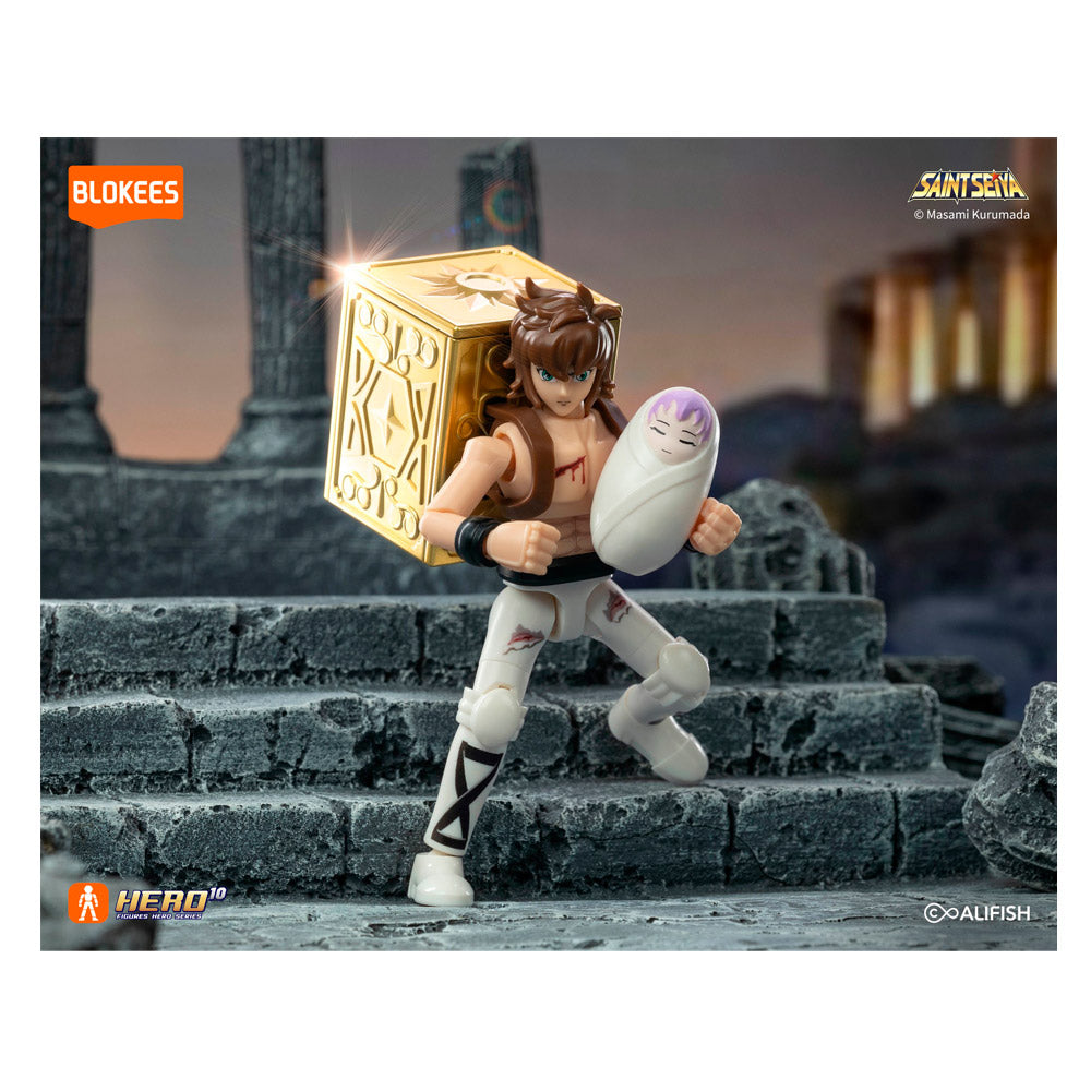 Figura Blokees sorpresa Saint Seiya colección con personaje y caja dorada en escenario antiguo